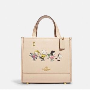 NWT Coach X Peanuts Dempsey Tote Bag - Snoopy & Friends - Ivory Pebbled Leather